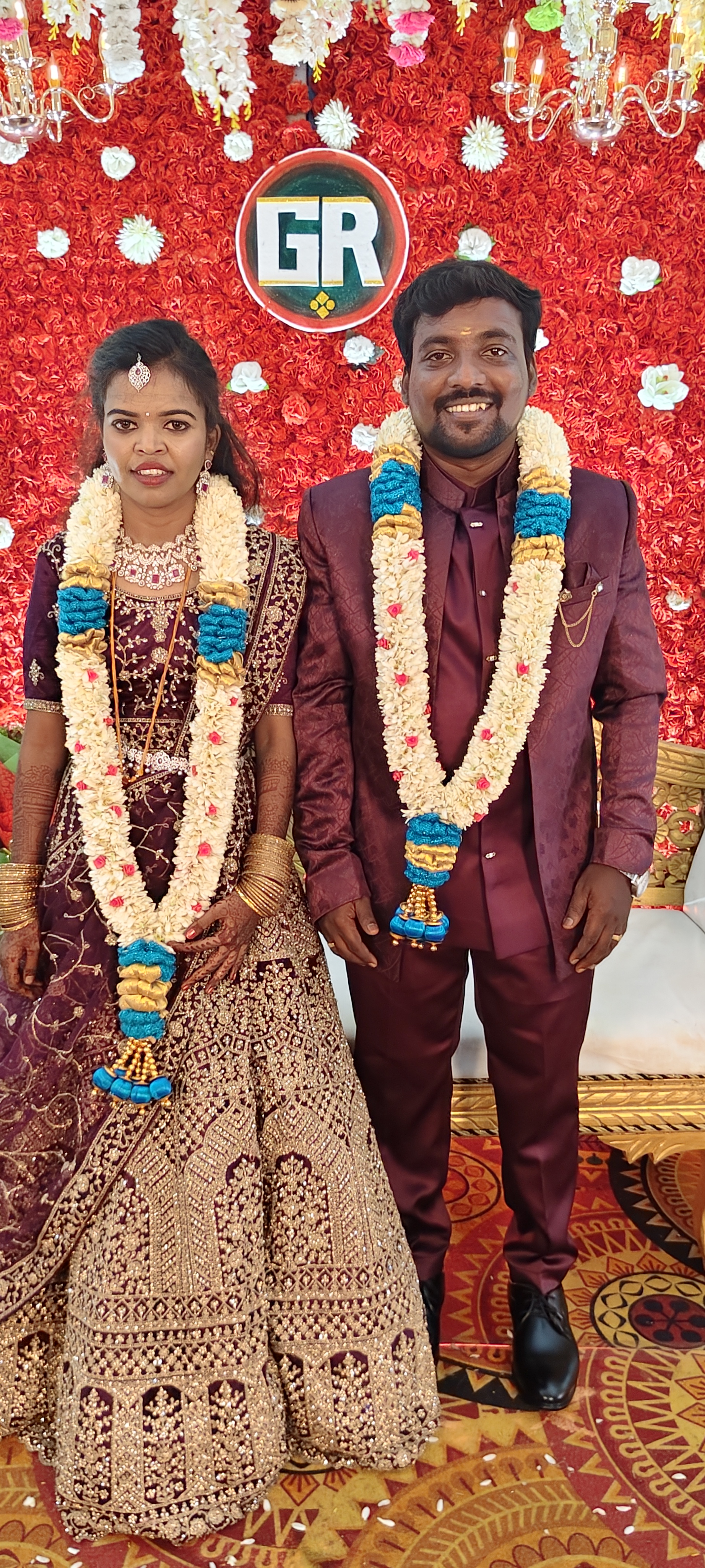 Couple at reception in coordinated outfits