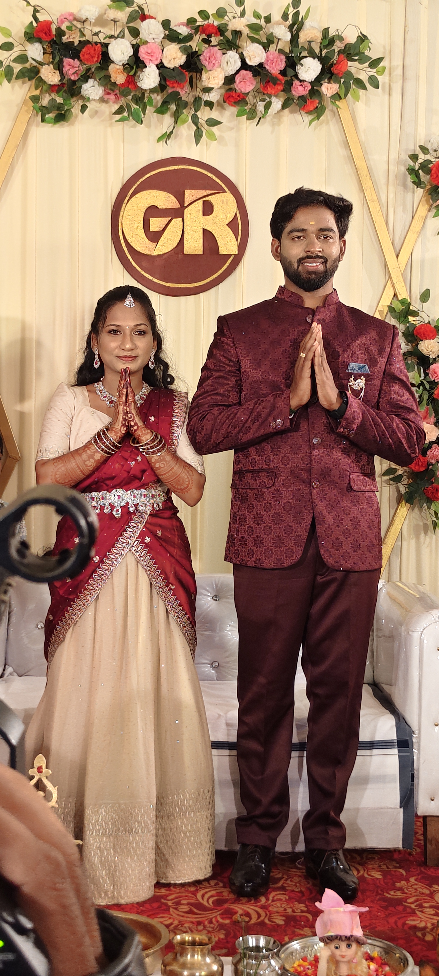 Couple at engagement ceremony after makeover