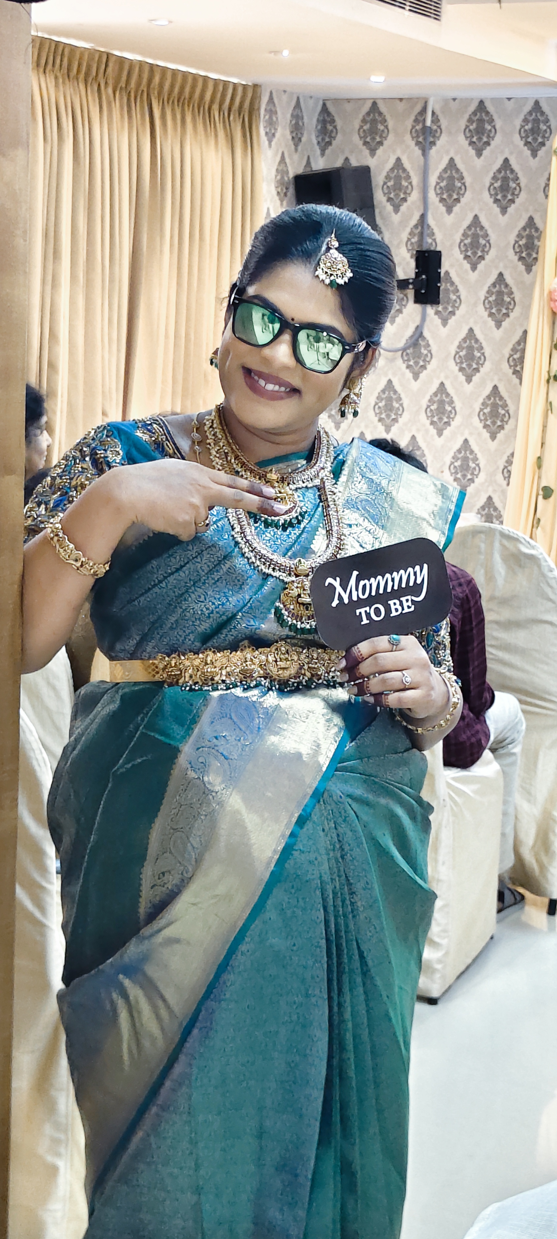 Mother-to-be styled for a baby shower function
